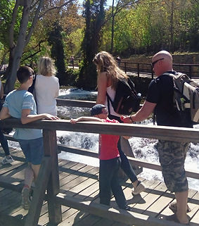 People cross the bridge