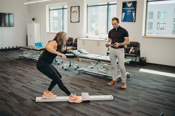 Runner tested for single-leg broad jump power during Rock Your Run biomechanics assessment, Spokane