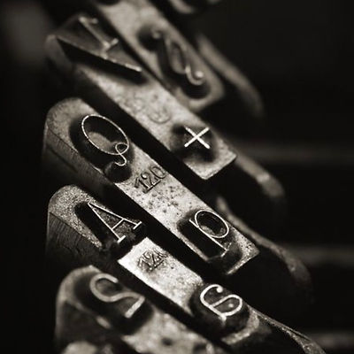 Close-up of antique typewriter keys representing truth, resistance, and the power to rewrite broken systems.