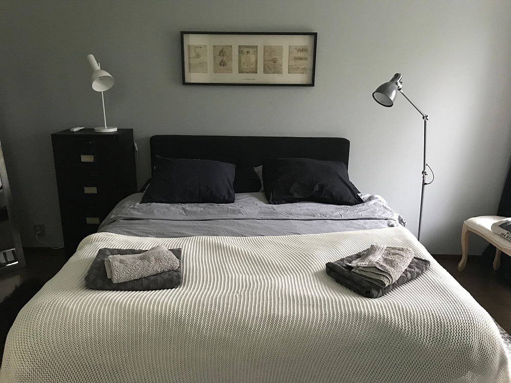View of the double bed in the master bedroom, villa Tuusula Finland