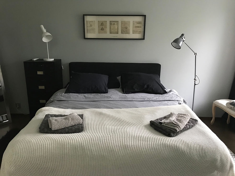 View of the double bed in the master bedroom, villa Tuusula Finland