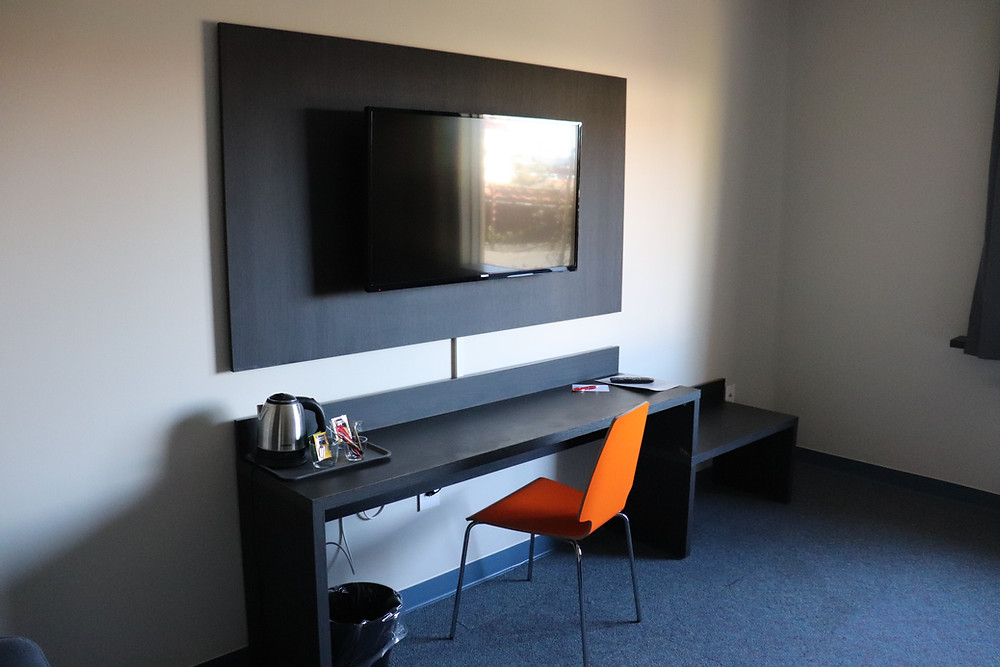 Writing desk and television inside Hotel B&B Keflavik Airport Iceland