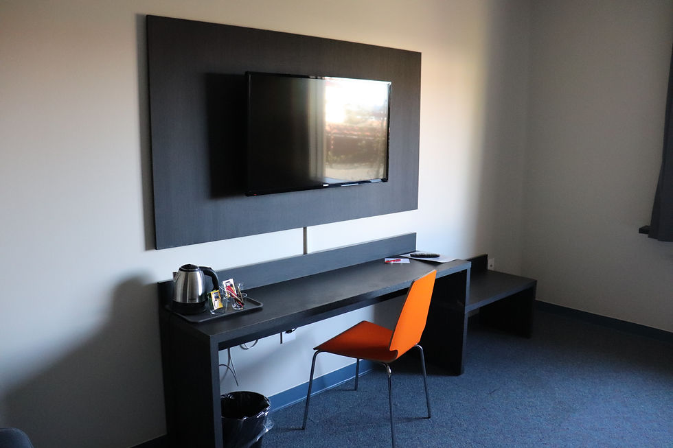Writing desk and television inside Hotel B&B Keflavik Airport Iceland