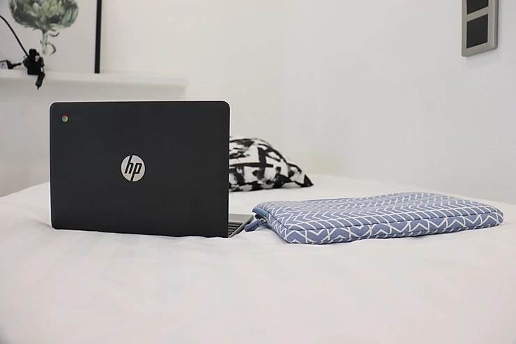 Hiisi Homes Haaga interior photo of laptop on bed Helsinki Finland