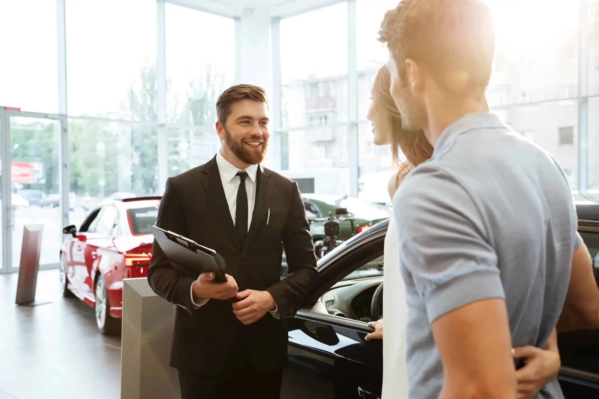 Car sales person closing a deal