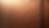 Close-up view of hammered copper metal texture on a decorative panel