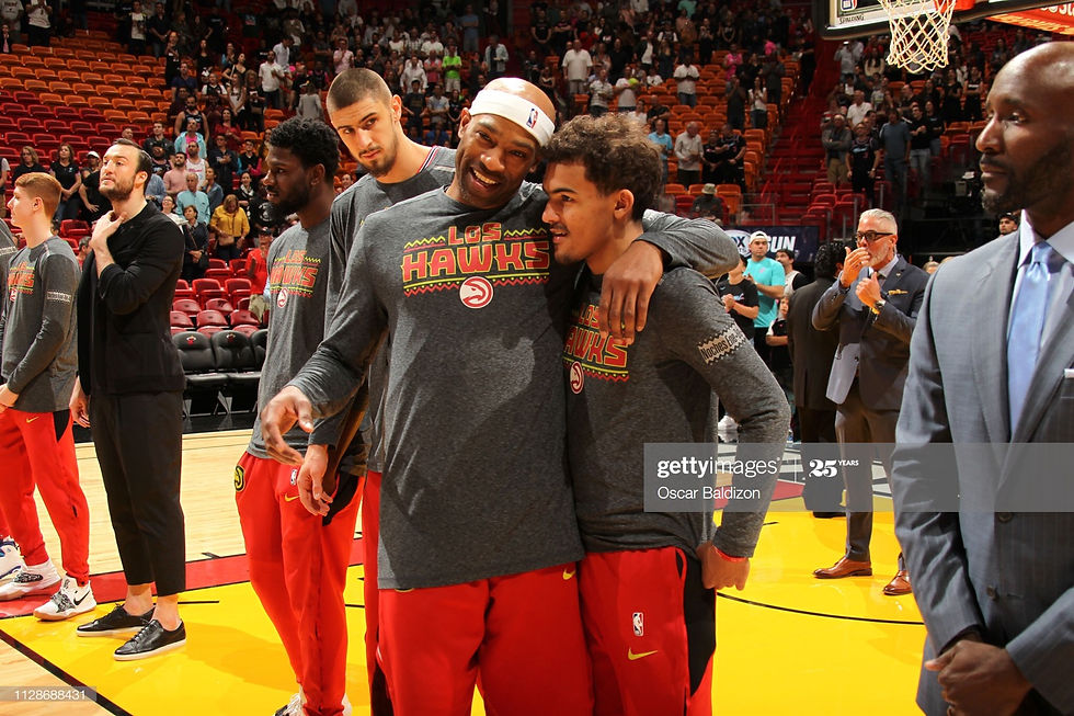 MIAMI, FL - MARCH 4: Vince Carter #15 of the Atlanta Hawks talks with Trae Young #11 of the Atlanta Hawks before the game against the Miami Heat on March 4, 2019 at American Airlines Arena in Miami, Florida. (Photo by Oscar Baldizon/NBAE via Getty Images)
