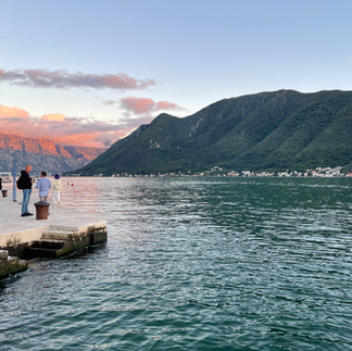 The sunset over the Bay of Kotor, Montenegro on our women-only group holiday tour Balkan Adventure