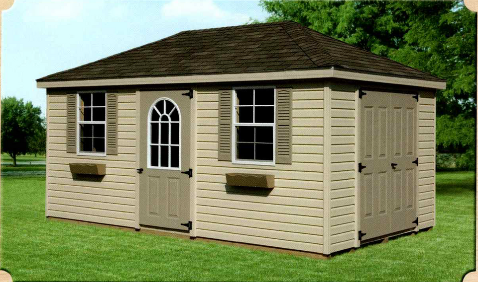 10x16 vinyl hip roof storage building featuring tan vinyl siding, decorative arched door with window, double-hung windows with shutters, and brown architectural shingle roof, displayed on manicured lawn