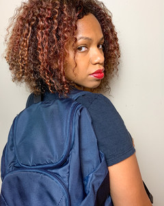 Me wearing the Travelon backpack