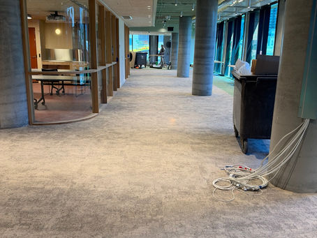 Finished carpet tile corridor at the Boyd Library flooring project