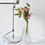 Thumbnail: drop vase clear crystal soliflower with helleborus