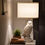 Thumbnail: Raymond Watson The Franklin Mint tablelamp The Snowy Owl  by night on sidetable bedroom brussels appartment