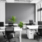 An office space with desks.