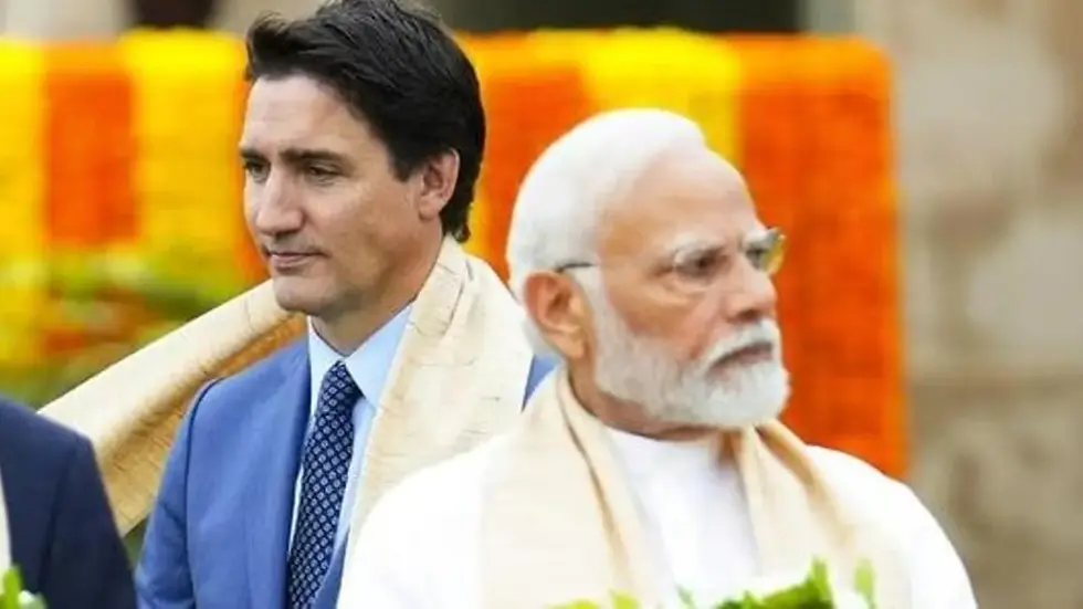 The Indian and Canadian flags displayed side by side, symbolizing the diplomatic tensions between the two nations following the expulsion of diplomats over allegations linked to Hardeep Singh Nijjar's assassination.