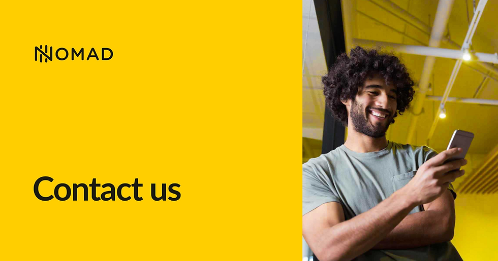 Man smiling at phone, standing indoors with yellow background. "Contact us" text and NOMAD logo on left. Bright, cheerful mood.
