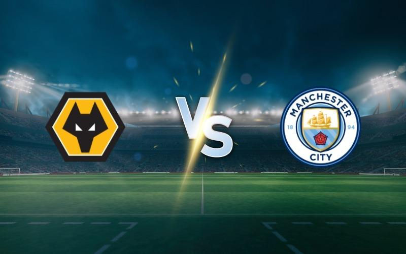 Wolverhampton vs. Manchester City logos on a stadium field background with bright floodlights and a dark, moody sky.