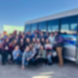 group of friends with shakin shuttle party bus