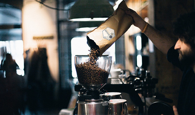 Pouring Coffee Beans_edited.jpg