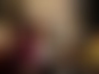 Conductor leading a joyful and engaged singing group in a concert