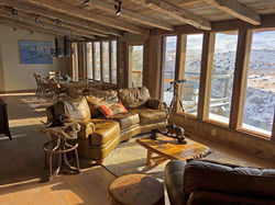 Guest Lodge windows looking out at Yellowstone National Park overlooking the Yellowstone River