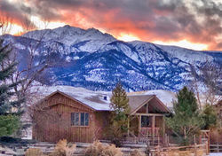 Guest Lodge with the mountains of Yellowstone in the background