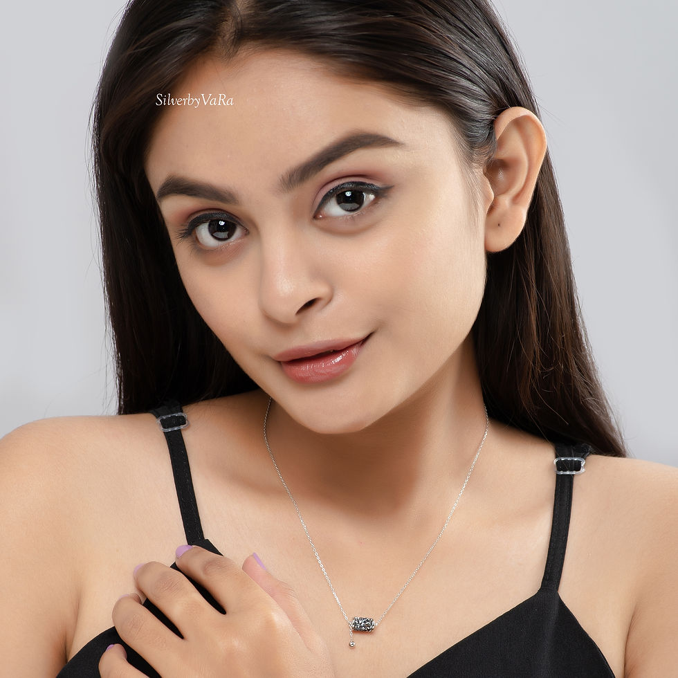 Thumbnail: Crystal cylinder with hanging silver necklace