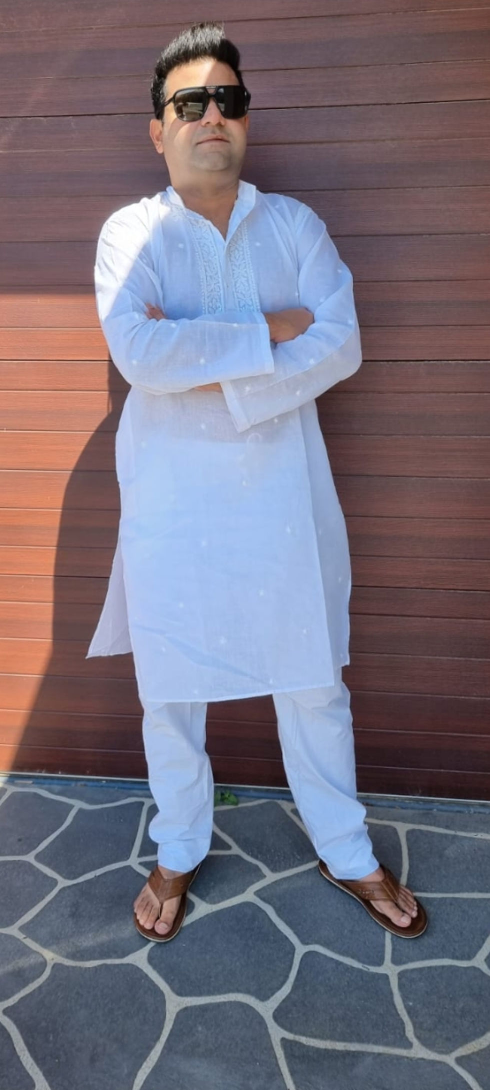 Pastel Chikan kurta styled with straight pants for casual wear