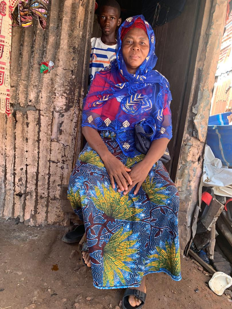 Strength doesn’t always roar—sometimes, it sells charcoal and raises six children alone.
