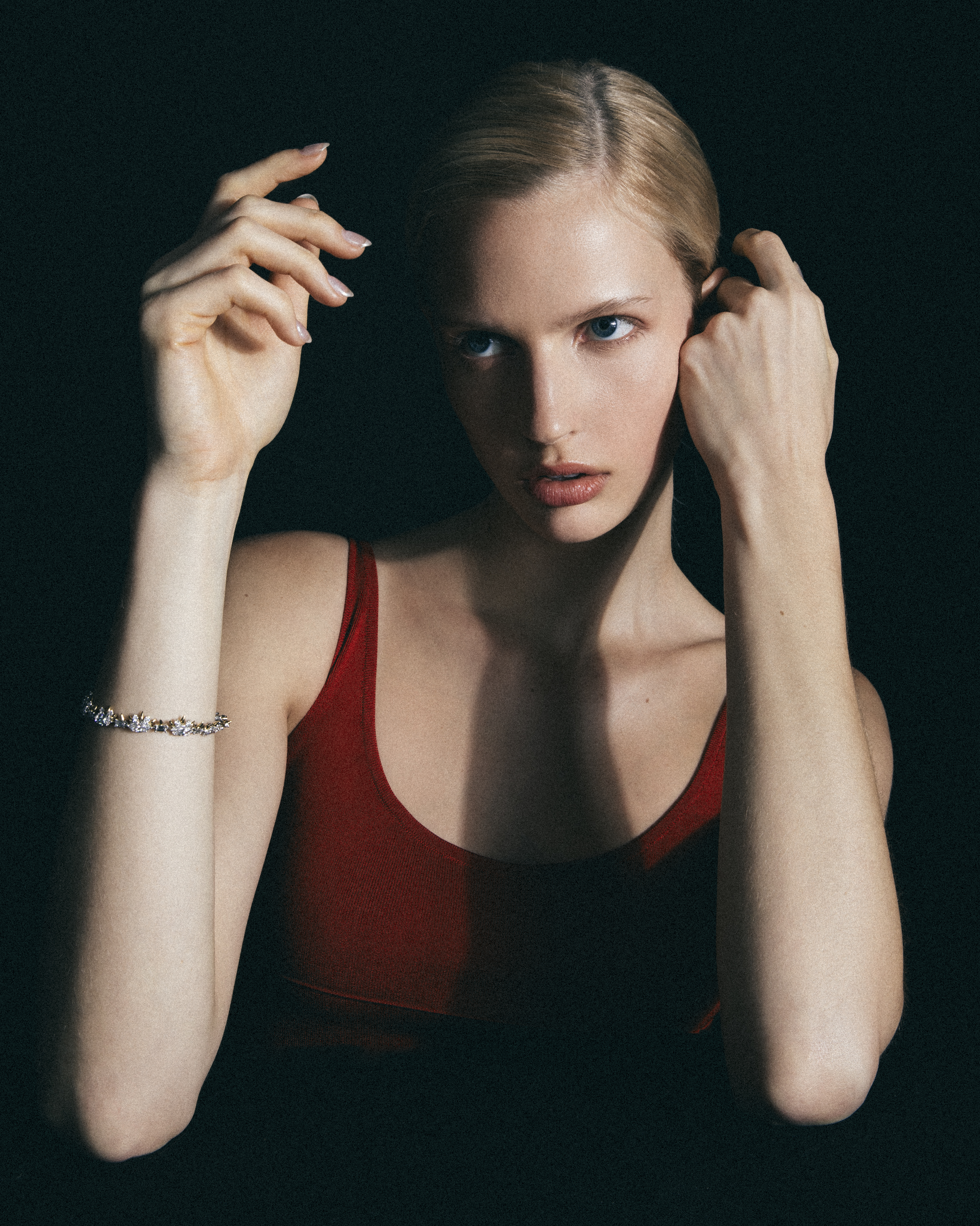 Vogue and Tiffany & Co high jewelry fashion editorial on model with Versace, Chanel, Dior, Fendi, McQueen, Phillip Lim  and Dolce and Gabbana fashion photography by Sharon Radisch