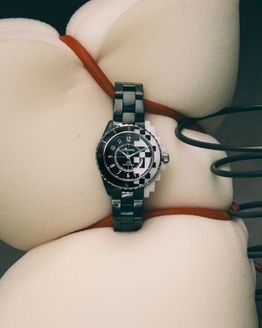 elle decor magazine photo luxury still life of Chanel watch