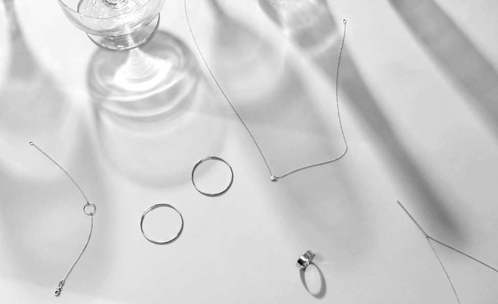 Gold Standard, a study of gold as a minimal yet elegant accent to everyday wear. Featuring jewelry by Vrai and Oro. Photography by Sharon Radisch
