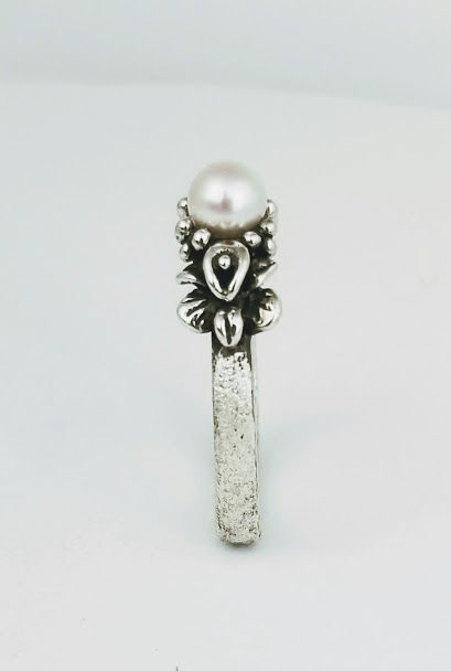 Thumbnail: Orchids and Pearl Ring