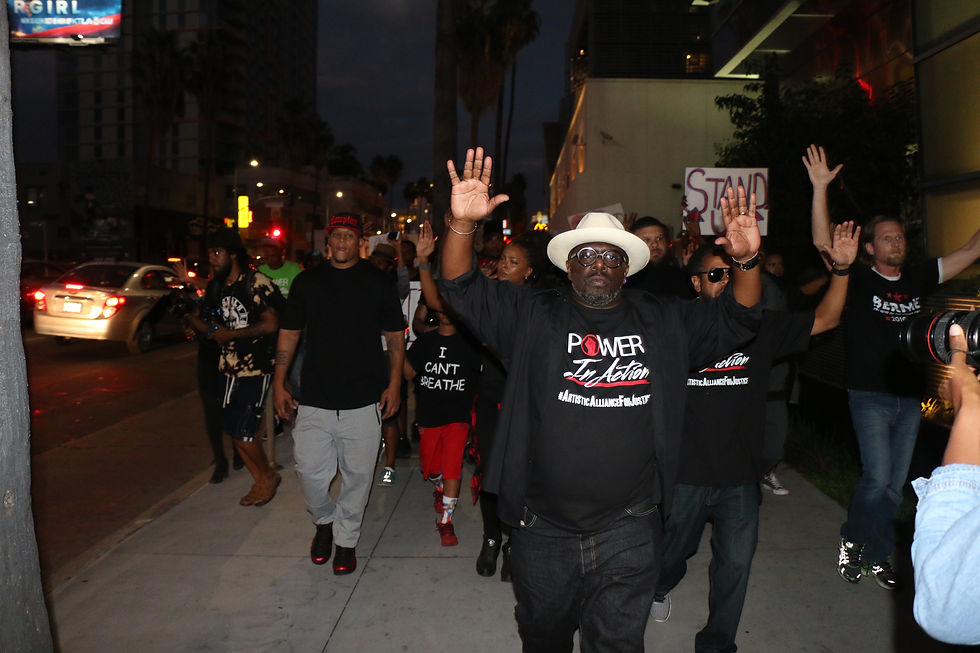 Comedian, Cedric the Entertainer leading the 'Power in Action' march (Photo by: Thai Lee)