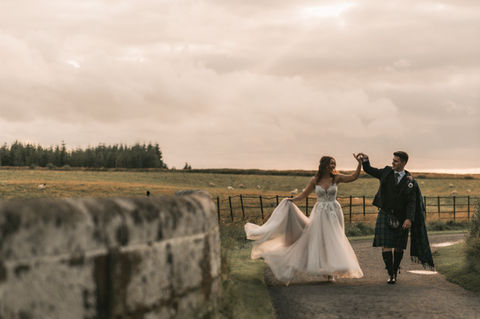 Bride and groom enjoying golden hour portraits at Cairns Farm Estate wedding venue