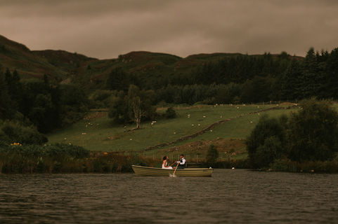 Bride and groom on the boat at Cardney Steading.