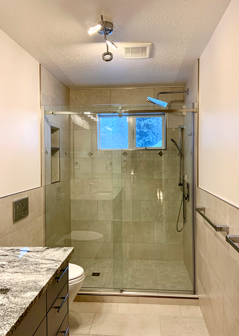 Custom Bathroom Renovation with Venetian Style Tile 
The tile and mosaic on this one match instead of contrasting for a change and came out great. The custom cut diamond shape mosaic inlay was included in the backsplash and around the door frame.