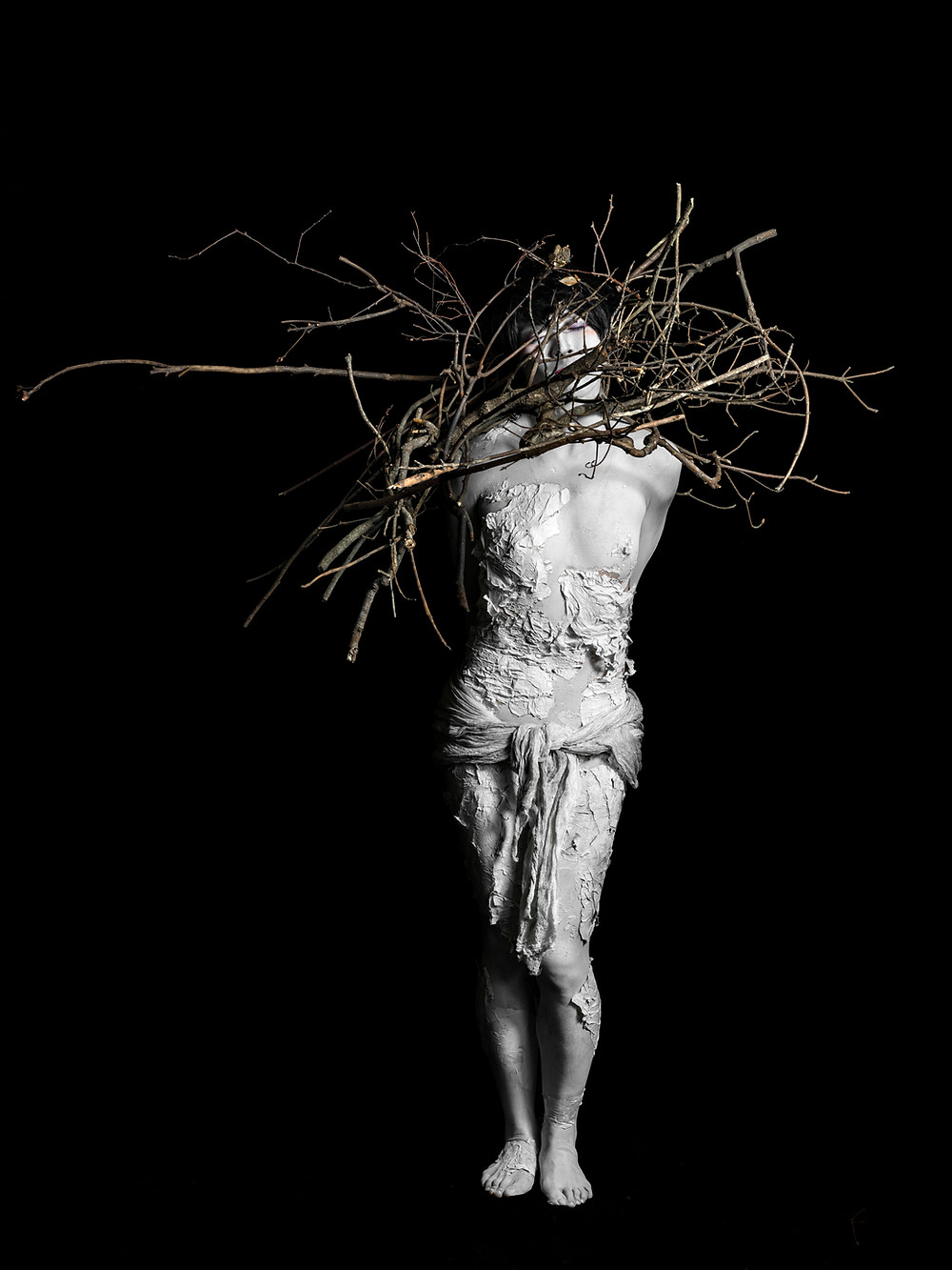 sculpture et bois entremélés