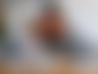 Three business professionals review information together at a conference table with a laptop, paperwork, and financial documents. Overlay labels highlight payroll reports, HR compliance, and financial oversight, representing integrated back-office support for a growing business.