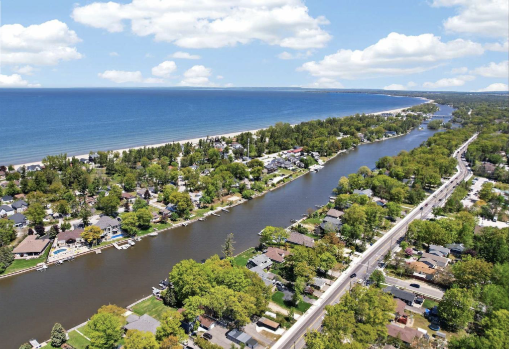 Aerial view of Wasaga Beach, Ontario looking over the shoreline, beachfront communities, and surrounding residential neighbourhoods – Velora Water Systems service area for premium water filtration and softener systems