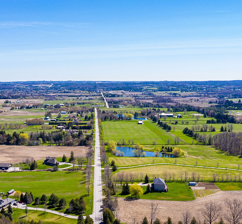 Aerial view of Schomberg, Ontario showing the village, surrounding rural landscapes, and residential neighbourhoods – Velora Water Systems service area for premium water filtration and softener systems