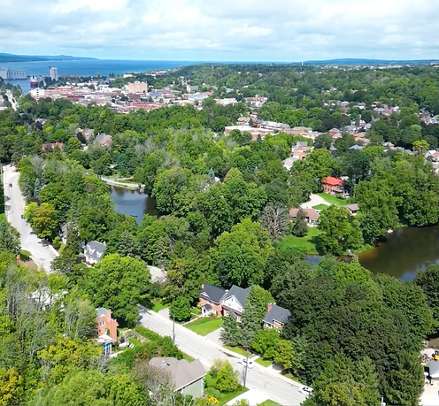 Aerial view of Owen Sound, Ontario looking over the harbour, downtown, and surrounding residential neighbourhoods on Georgian Bay – Velora Water Systems service area for premium water filtration and softener systems