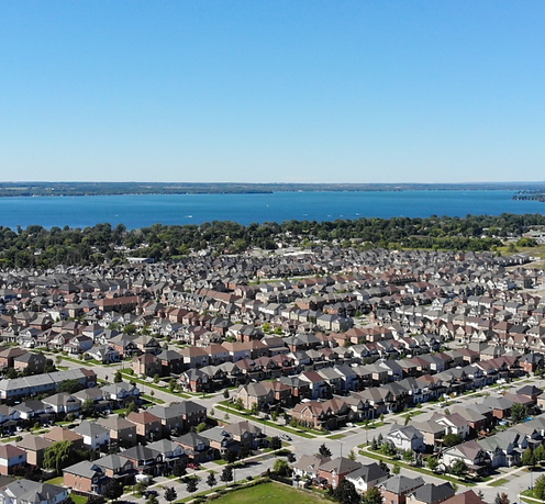 Aerial view of Georgina, Ontario looking over Lake Simcoe, waterfront communities, and surrounding residential neighbourhoods – Velora Water Systems service area for premium water filtration and softener systems