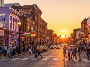Nashville Broadway street with neon lights at golden hour