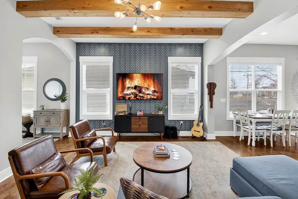 Family-friendly Nashville vacation rental living room with fireplace and open concept design