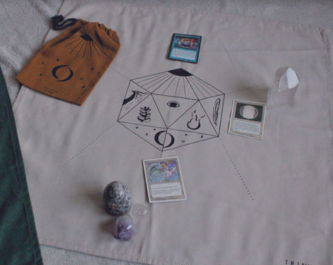 Tarot Cloth – a sacred geometry design built around a hexagon: the four elements encircle the Self at the center, with the Sun revealing what is in light and the Moon mirroring what remains in shadow.