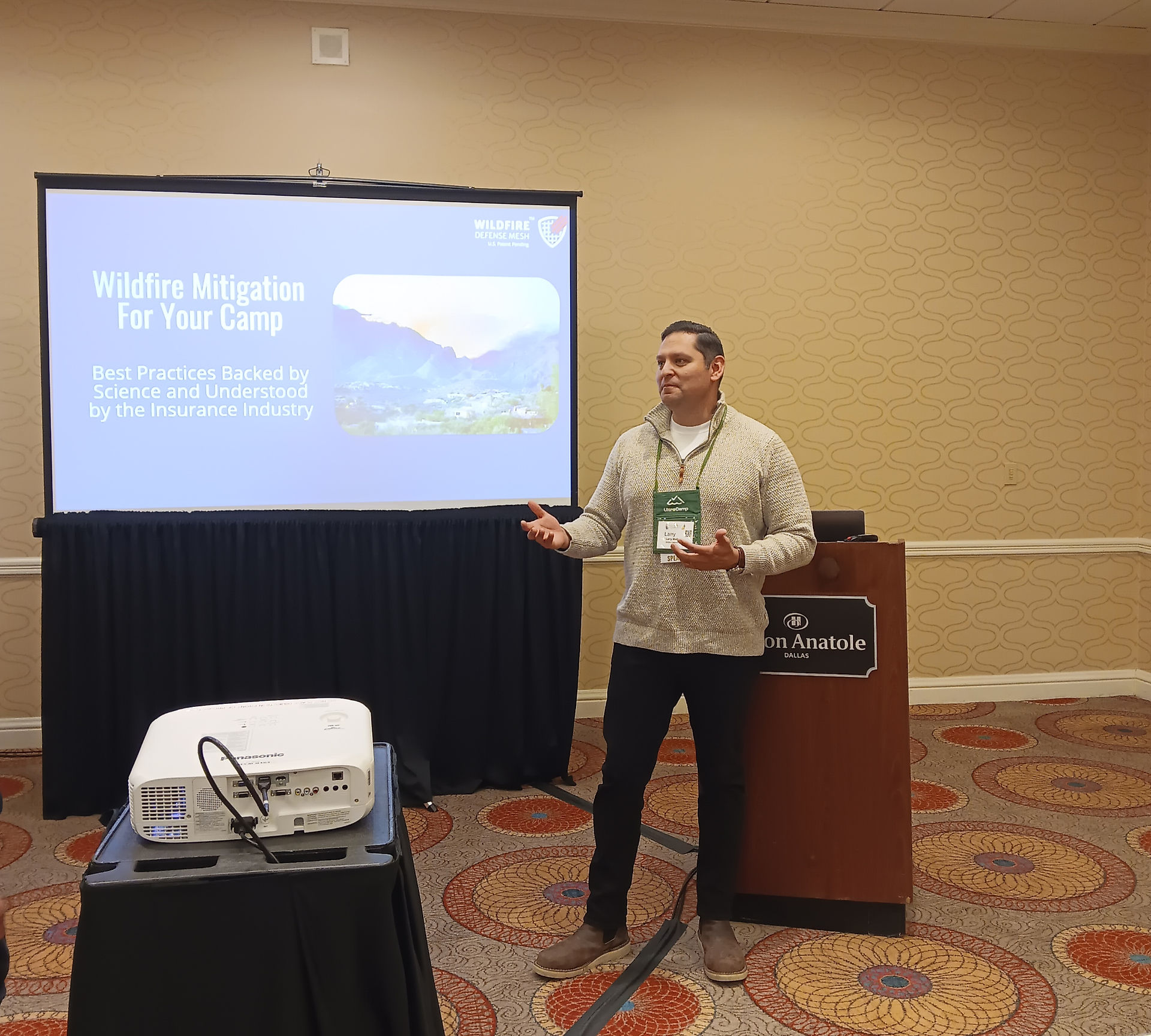 An ARU representative presenting 'Wildfire Mitigation For Your Camp'.