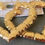 Thumbnail: Multiple Hoops in a pack with Heart Bamboo hoops in  Gold and Silver