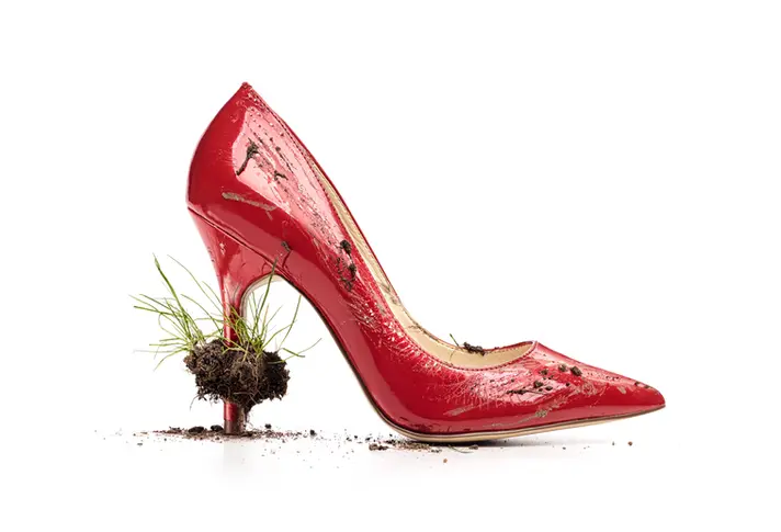 Luxury red high heel photographed in editorial commercial fashion photography setup
