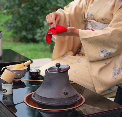 Woman in kimono performs Japanese tea ceremony_edited.jpg